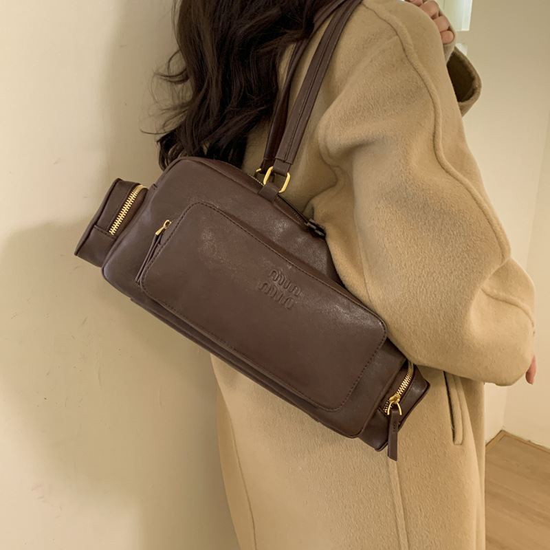 Diseño de nicho transfronterizo bolso de locomotora multibolsillo bolso de almohada portátil de viaje retro de mujer bolso de hombro casual brazo