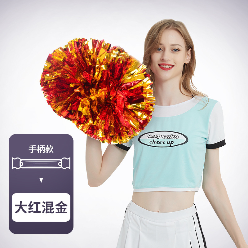 花のボールの応援団の手の花の手の手の花の運動会の手は道具の応援の道具の現物を持ちます。|undefined