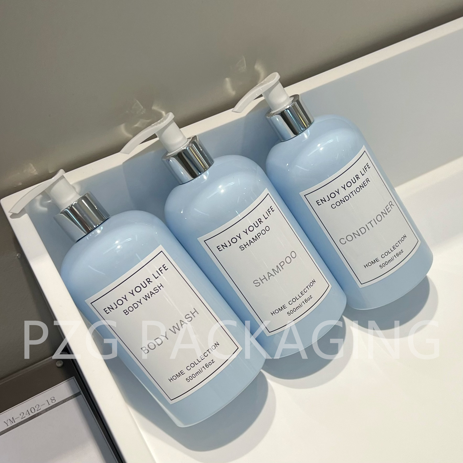 Azul simple Boston hombro redondo de gran capacidad comercial 500ml botella de emulsión de plástico a prueba de fugas