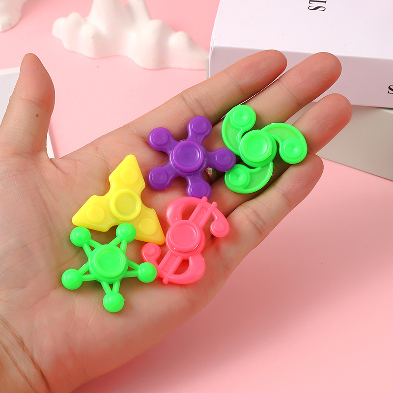 Mini small gyro 4cm fingertip gyro decompression gyro toy multi-shape plastic mini fingertip gyro