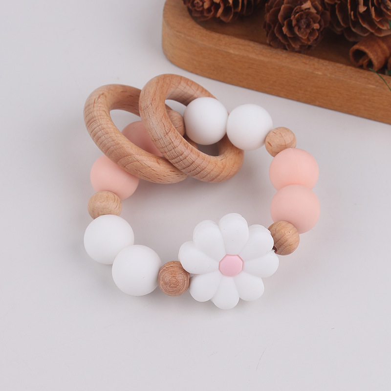 Nuevo juguete de mano para bebé con sonajero, los molares de los niños pueden morder el castaño de haya, margarita, pulsera de flores, mordedor