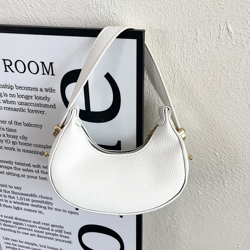 Bolso pequeño para mujeres 2026 nuevo nicho de diseño de tendencia de verano personalidad moda moda moda popular bolso de media luna de hombro bolso axilar