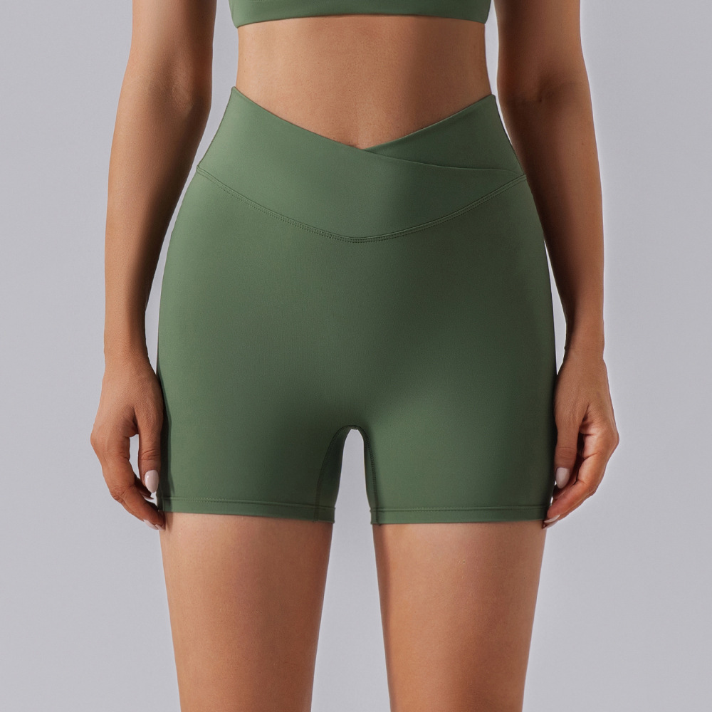 Procesamiento personalizado europeo y americano elástico mel桃 hips fitness pantalones cortos desnudos secado rápido sexy para elevar las hips de yoga de mujer panty