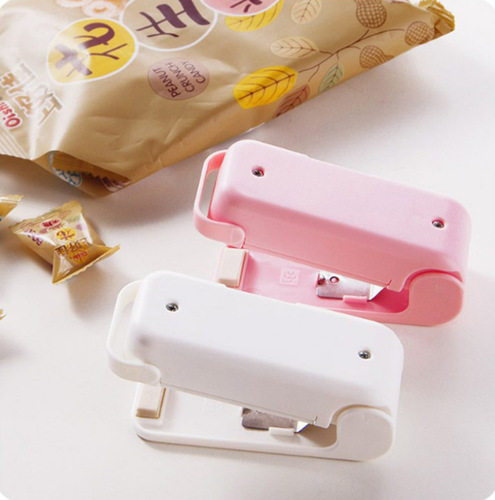 Home portable mini sealing machine Food plastic sealing machine Snack plastic bag sealing machine Home hand pressure heat sealing machine