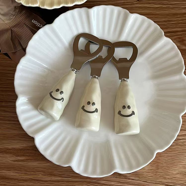 不锈钢开盖可爱笑脸啤酒开瓶器塑料柄仿陶瓷柄可站立创意酒瓶起子|undefined