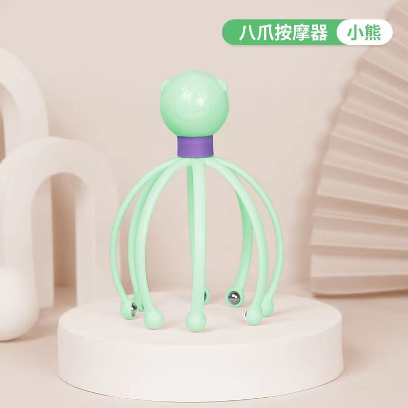 頭の経絡の頭をつかむ器の磁気ボールはマッサージの器具を持ってリラックスして頭皮の八爪の魚を押して便利に回転して卸売りします。|undefined