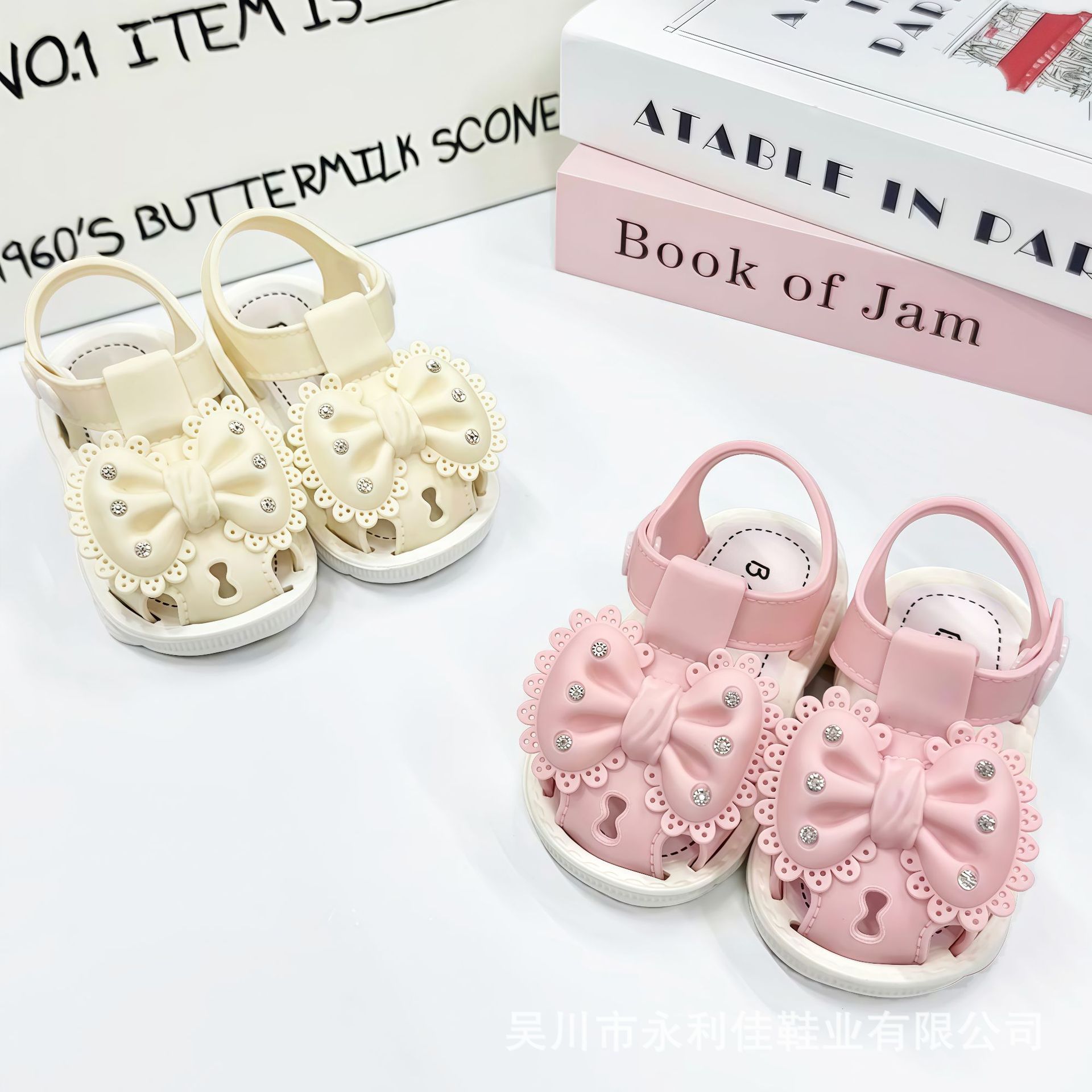 Fábrica de sandalias al por mayor transfronterizas suministro directo de arco de perforación de agua pequeña y media niña bebé zapatos de toddler pequeña princesa