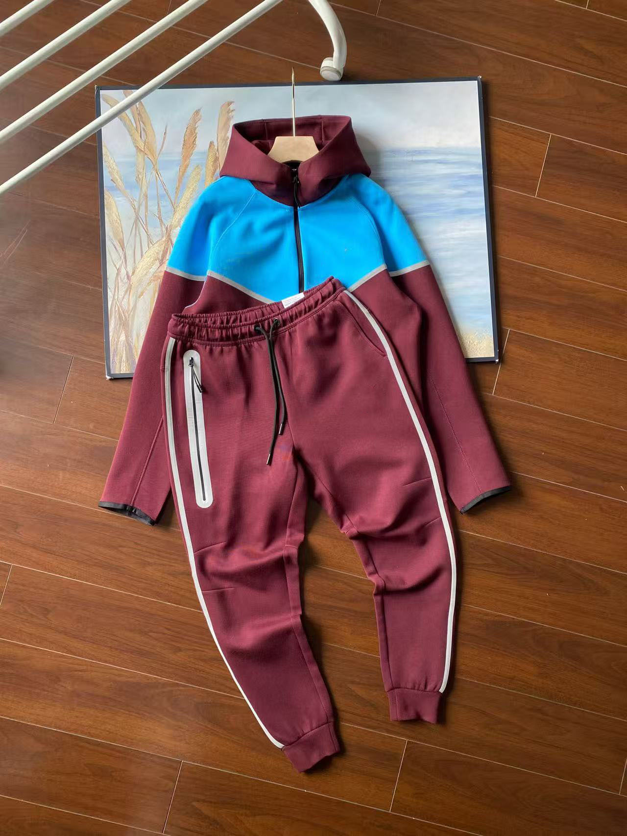 25 años de nuevo chaqueta deportiva encapuchada chaqueta de aire capa de algodón chaqueta con cremallera chaqueta de estampado reflectante otoño conjunto de chaqueta