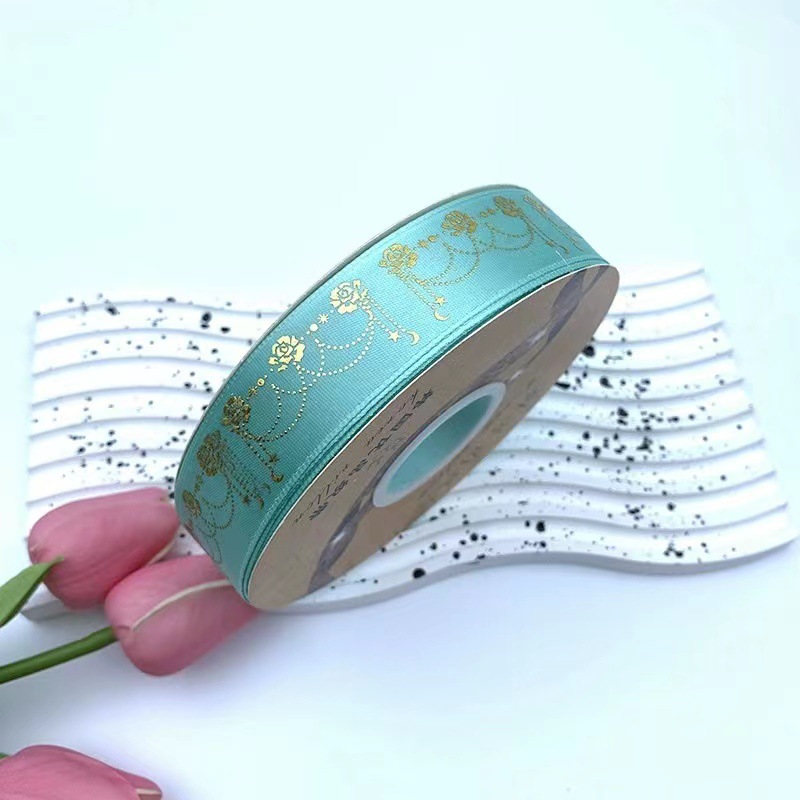 2,5 cm láser cinta de oro estrella Luna flor joyería DIY caja de regalo embalaje barra soporte cinta hecha a mano nueva venta al por mayor