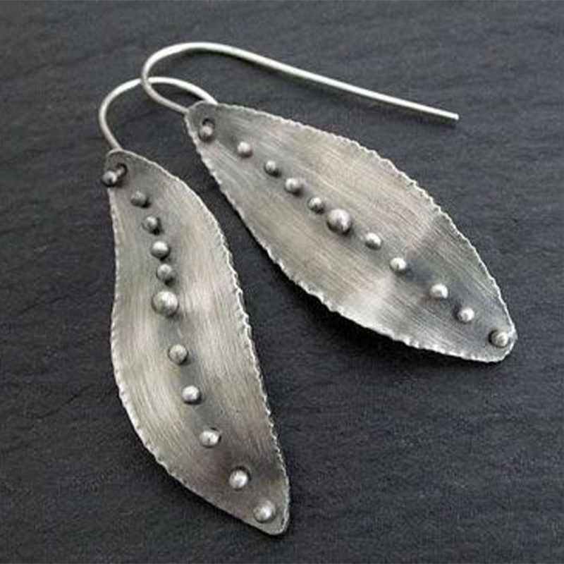 Retro Simple Leaf-shaped Alloy Irregular Earrings Wholesale display picture 3