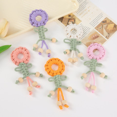 日韓シンプルで可愛い手編み綿の花のキーホルダーに飾られています。