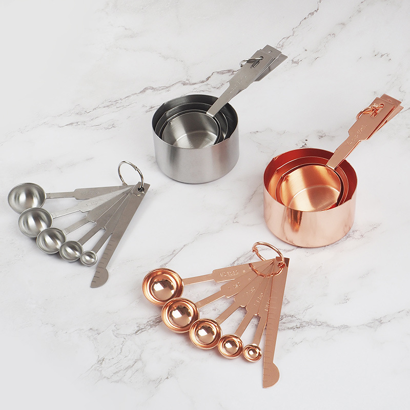 copper golden measuring cup stainless steel contains rose