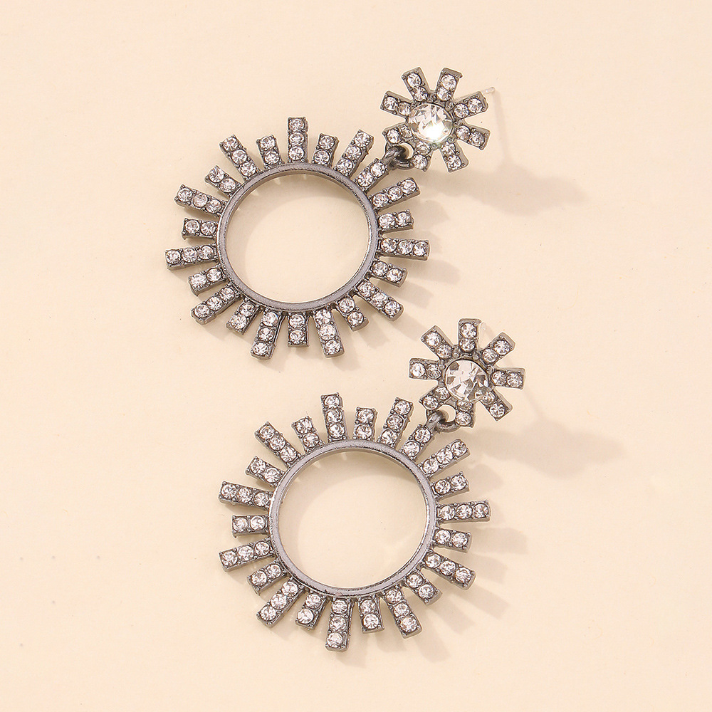 Fashion Geometric Hollow Round Rhinestone Sunflower Alloy Earrings Wholesale display picture 4