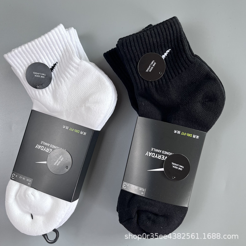 Suwannike socks black and white mid-calf high towel bottom running sports socks men's cotton wholesale