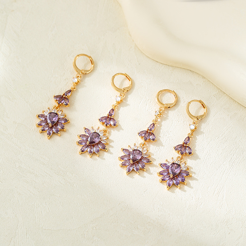Europa y los Estados Unidos lujoso color zircon auriculares temperamento versátil nicho de diseño de alto nivel flor colgante pendientes para mujeres nuevas