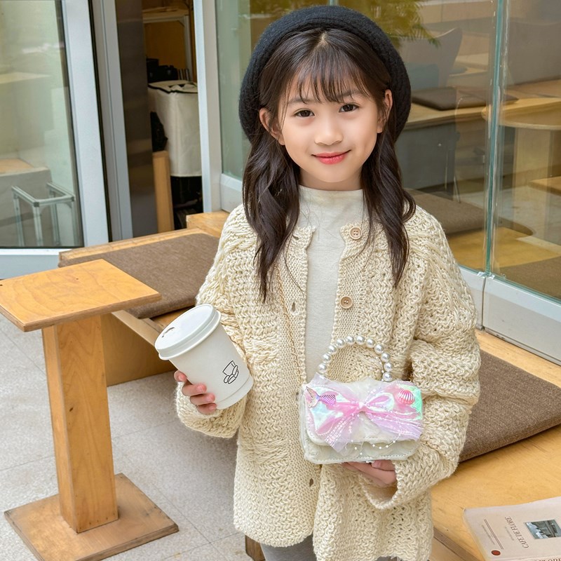Dulce princesa bolso de hombro de perlas de aire extranjero bolso de mano bebé 2025 nuevo bolso de moda para niños