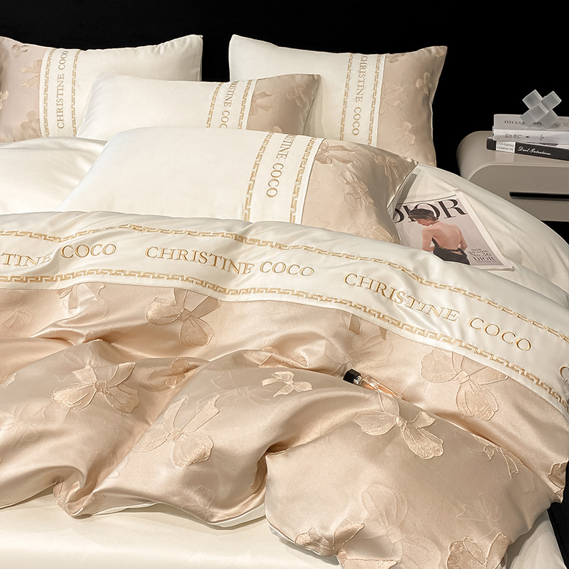 Juego de cuatro piezas de cama jacquard de seda de hielo de verano 2025 nueva funda de edredón de sábana fresca ropa de cama de alta gama de lujo ligero