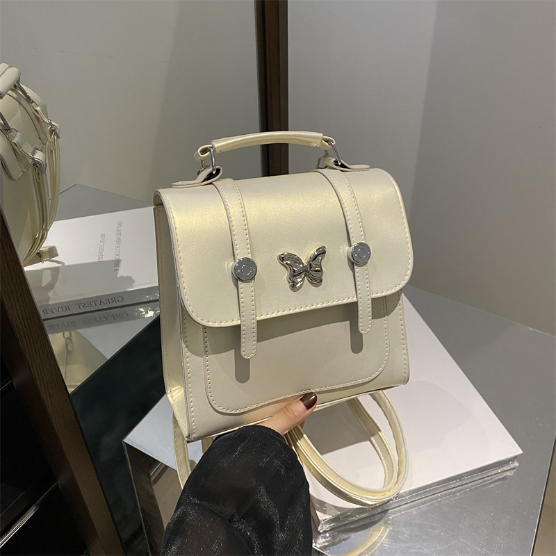 Butterfly mochila para mujeres 2024 nuevo retro versátil mochila escolar pequeña mochila de estilo universitario bolso de clase