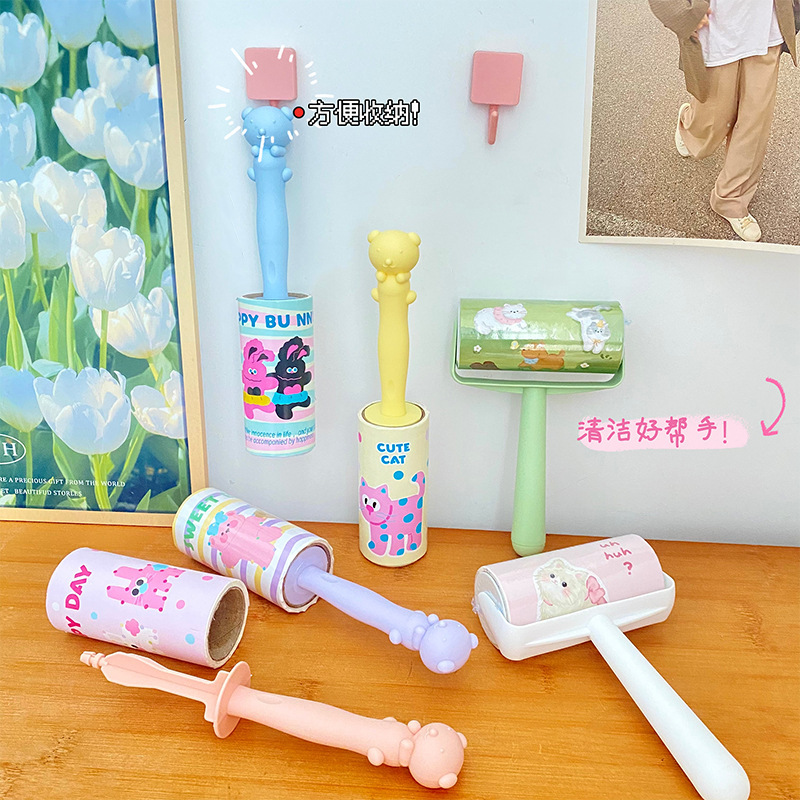 かわいいアニメの粘毛器の清新な学生の粘毛ロールの家の手動粘毛器のドラム式は粘毛の神器を引き裂くことができます。|undefined