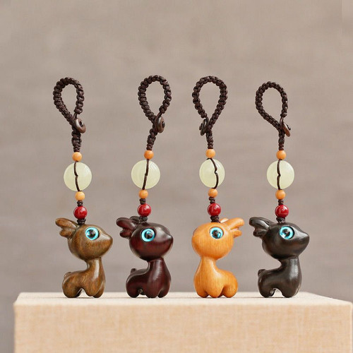 Cartoon key pendant cute sandalwood internet celebrity Yulu Ping An boys and girls car keychain couple gift pendant