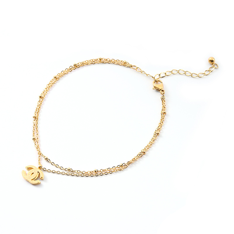 JL-0105: Chanel oro elegante