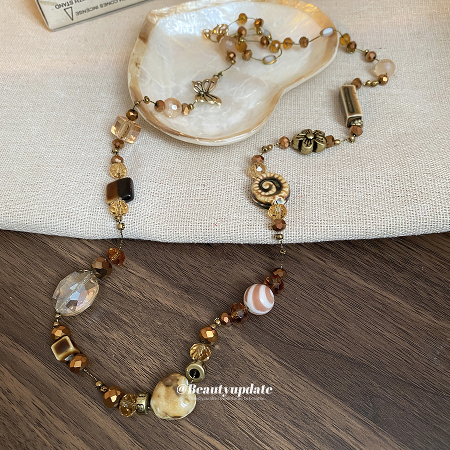 Mariposa flor cerámica amor cristal artificial collar de alta gama otoño e invierno suéter cadena mujer retro nicho joyería