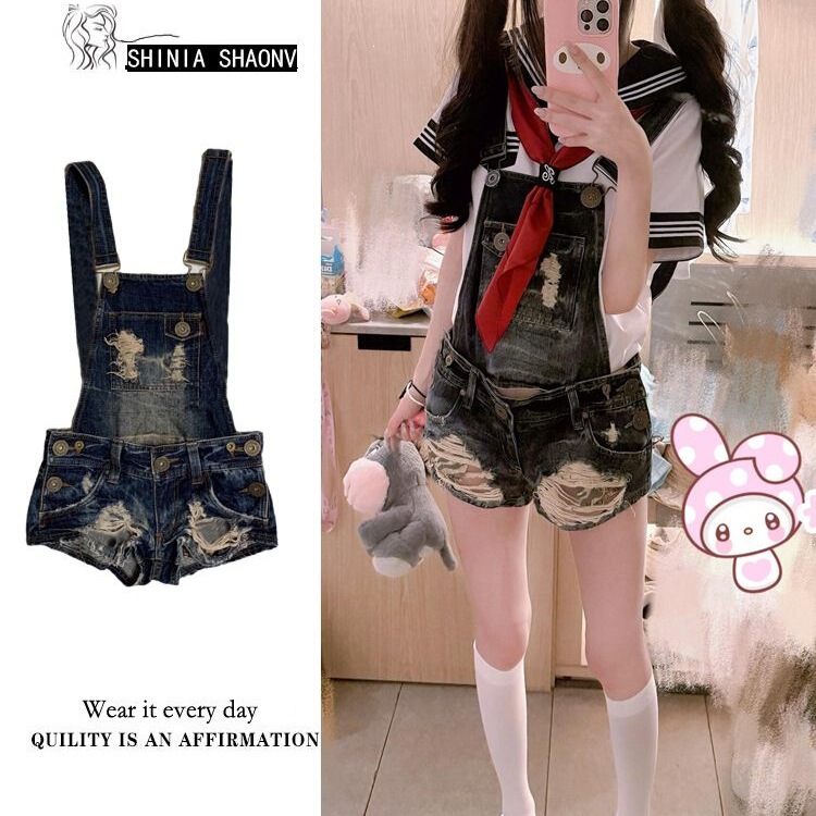 Washed Distressed Denim Overalls Shorts for Women with a Stylish Design and a Waist-Cinching One-Piece Short Design Washed Distressed Denim Overalls Shorts for Women with a Stylish Design and a Waist-Cinching One-Piece Short Design