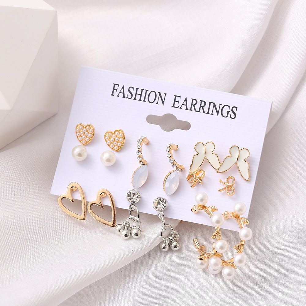 Fashion Heart Shape Bow Knot Alloy Inlay Artificial Pearls Zircon Women's Drop Earrings Ear Studs 1 Set display picture 4