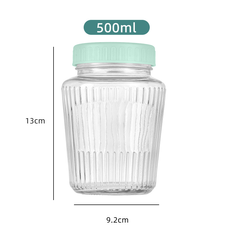 녹색 플라스틱 뚜껑이있는 500ml 유리 항아리; 투명