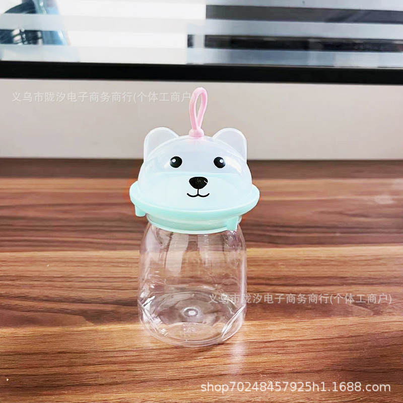 PET alimentos grado espesado botella de plástico transparente sellado caramelo soluble frijol de arcilla de color frasco de embalaje puesto lindo Oso de dibujos animados