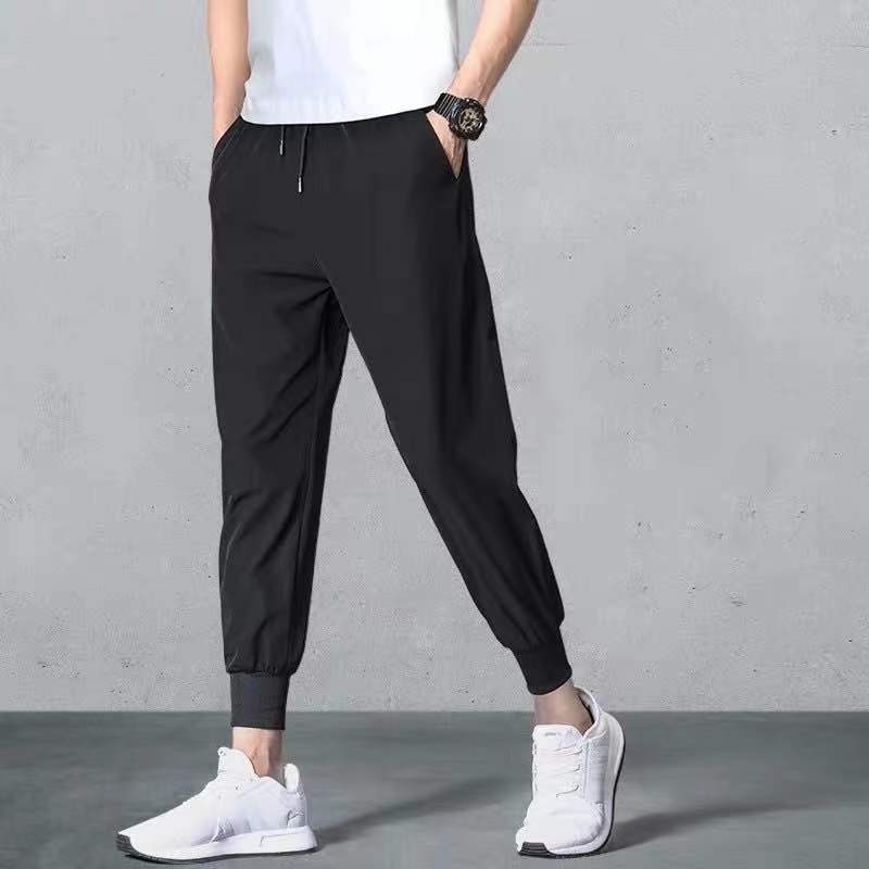 Pantalones de Cachemira de invierno para hombres Nuevos pantalones casuales gruesos súper gruesos con forro polar sueltos más pantalones largos cálidos de algodón