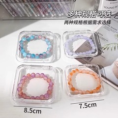 水晶の手の串の収納箱の防塵ブレスレットのネックレスのアクセサリーの文は小型の透明なアクリルのアクセサリーの箱を遊びます。