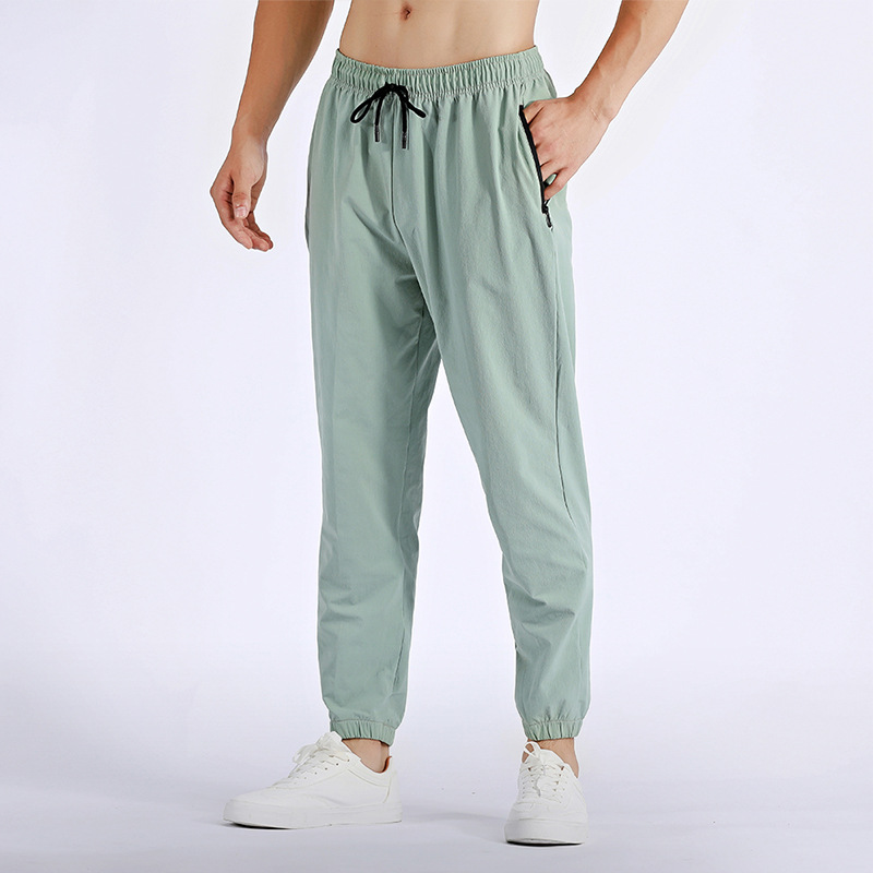 Otoño e invierno Pantalones deportivos al aire libre deportes correr pantalones de hombre ropa casual pantalones de fitness de secado rápido pantalones de chándal de baloncesto pantalones atados al tobillo