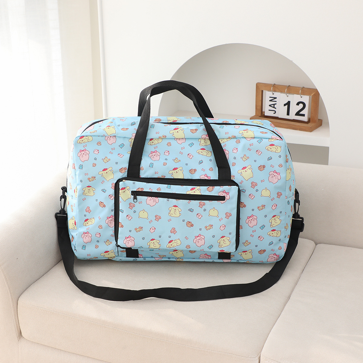 虹熊クロミ大容量手提げ旅行袋は旅行箱のポールに挿してもいいです。