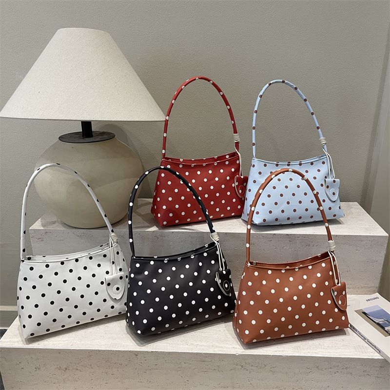 New stylish and versatile minimalist handbag, fashionable and unique polka dot shoulder bag, chic and textured commuter underarm bag