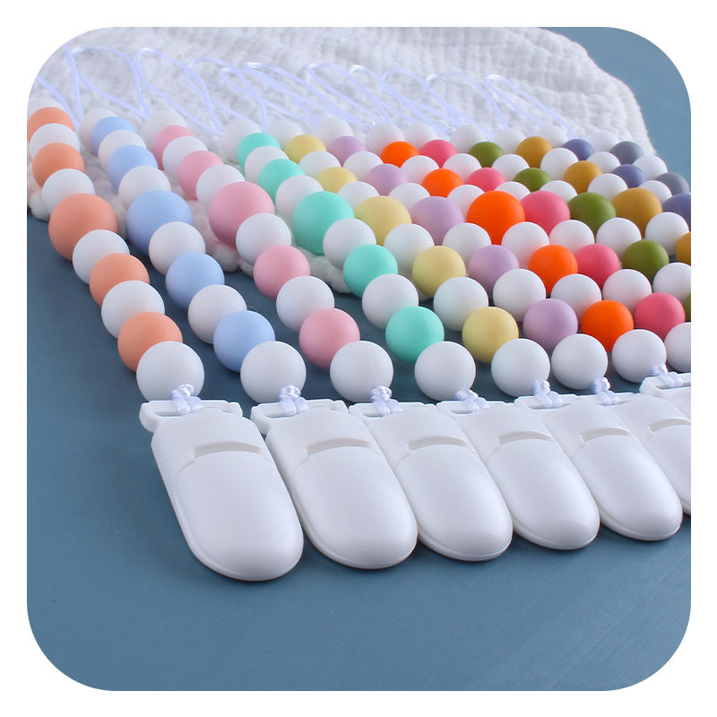 Nuevos suministros para bebés clip de pico de pato de plástico cuentas de silicona mordedor bebé juguetes molares chupete cadena anti-caída cadena