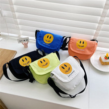 韩版儿童包包可爱笑脸女童休闲单肩挎包超酷男童帆布斜挎包批发