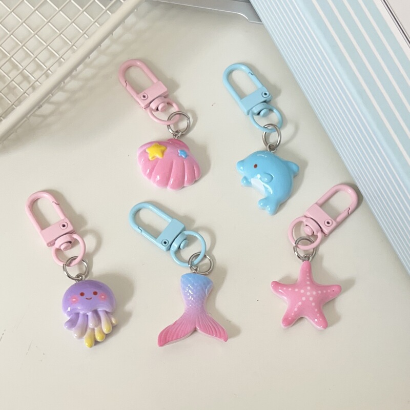 Pink and Soft Ocean Animal Keychain, Cute Cartoon Dolphin Shell Pendant, Ins-Style Soft and Adorable Starfish and Jellyfish Accessories Pink and Soft Ocean Animal Keychain, Cute Cartoon Dolphin Shell Pendant, Ins-Style Soft and Adorable Starfish and Jellyfish Accessories