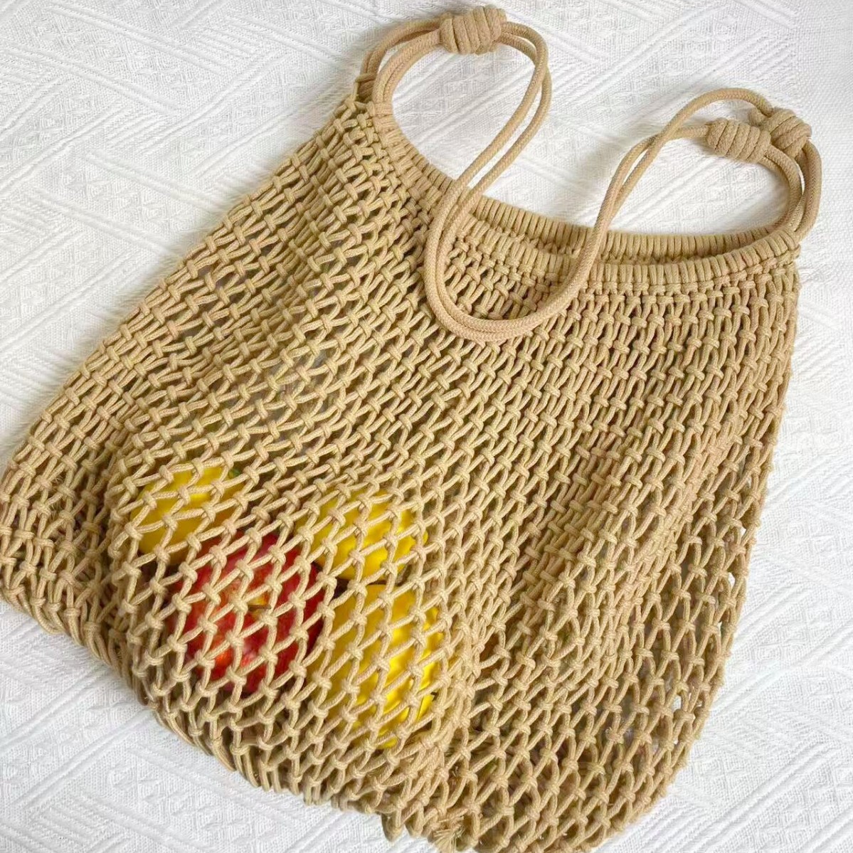 新款小众高级感镂空手工扇形草编包渔网包大容量编织女包网袋