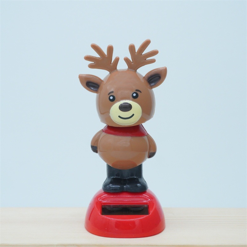 Cross-border Christmas solar energy automatic swing doll car interior shake head decorations creative car car ornaments