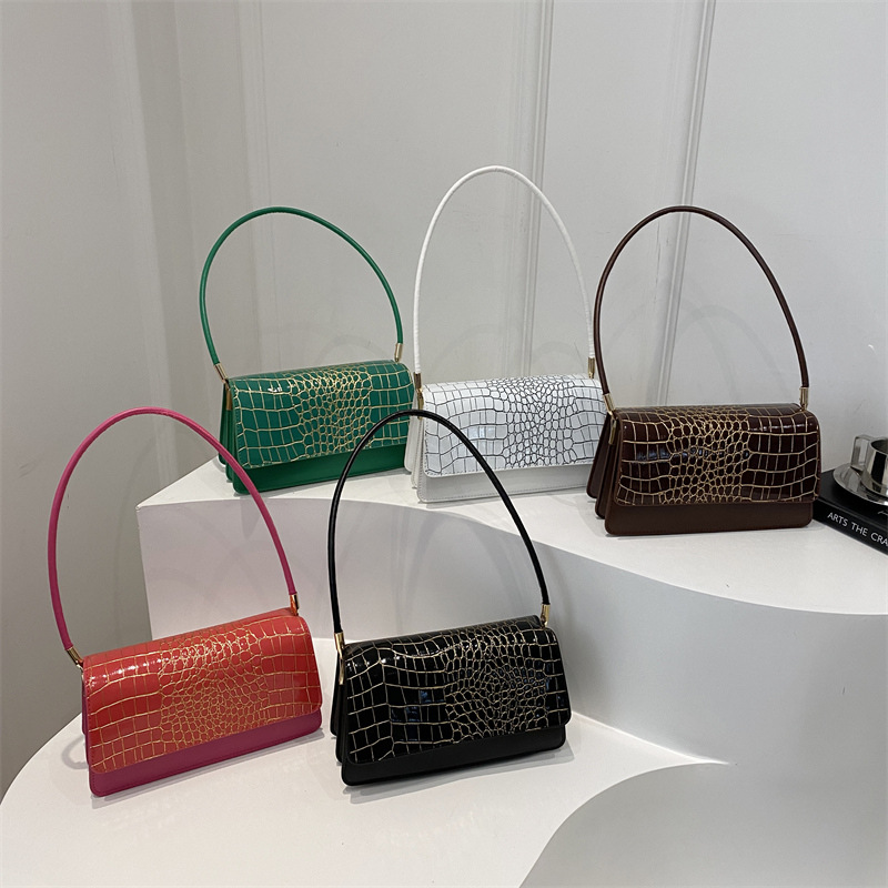 2025 primavera nuevo color sólido temperamento cocodrilo bolso de mano bolso de hombro de moda moda moda elegante bolso de mujer debajo de las axilas