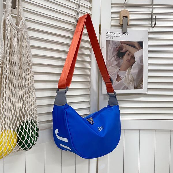 Universal capacious shoulder bag for men and women