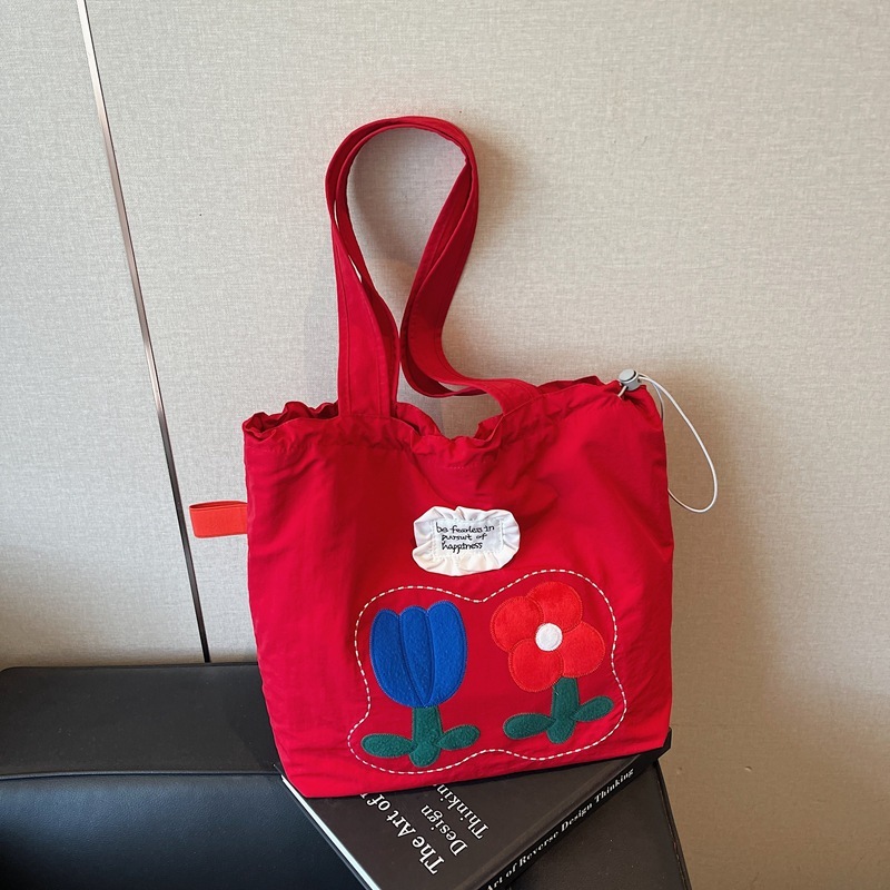 2025 夏の新スタイルナイロン刺繍巾着トートバッグ女性の韓国スタイルリラックスニッチ大容量ショルダーバッグ|undefined