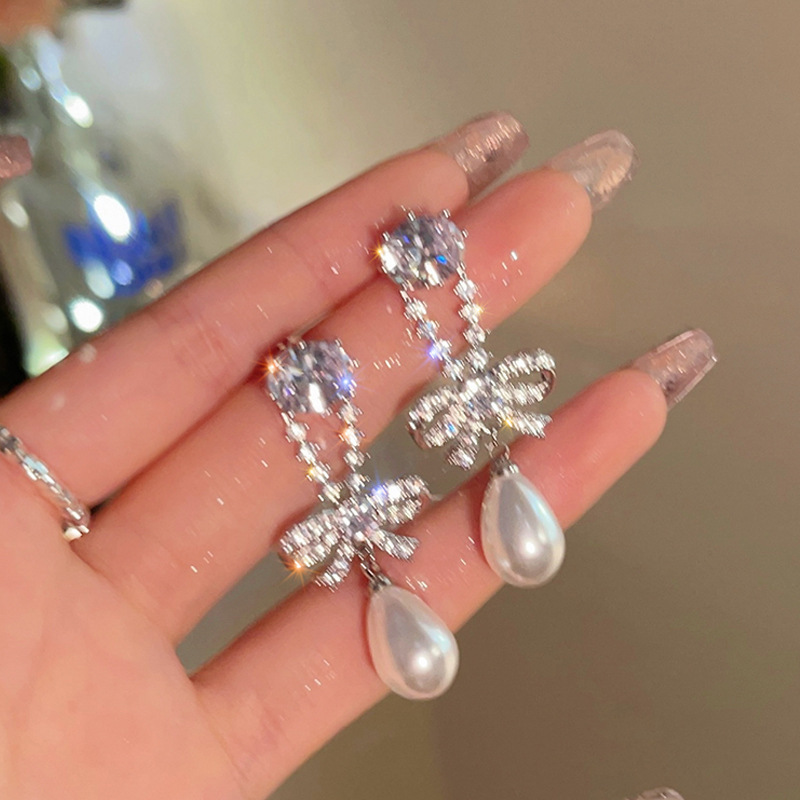 Pendientes de circón súper flash de alta calidad con aguja de plata 925 Pendientes de estilo explosivo de temperamento exquisito de lujo ligero femenino Pendientes de primavera y verano al por mayor