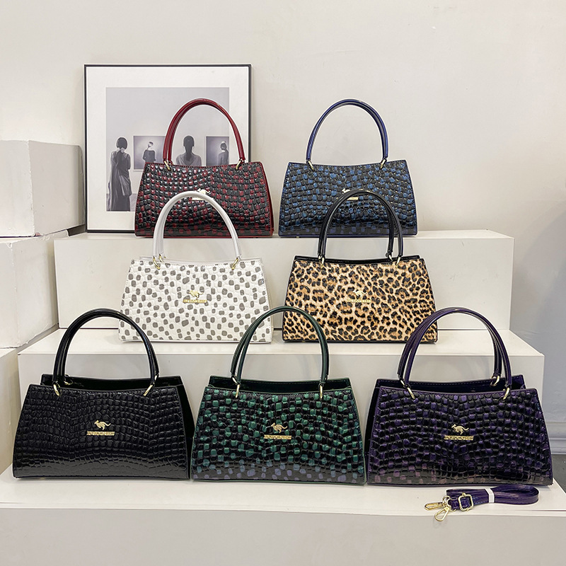 Bolso de gran capacidad 2023 nuevo bolso de mensajero de un solo hombro de moda bolso de patrón de piedra de superficie brillante simple bolso de textura