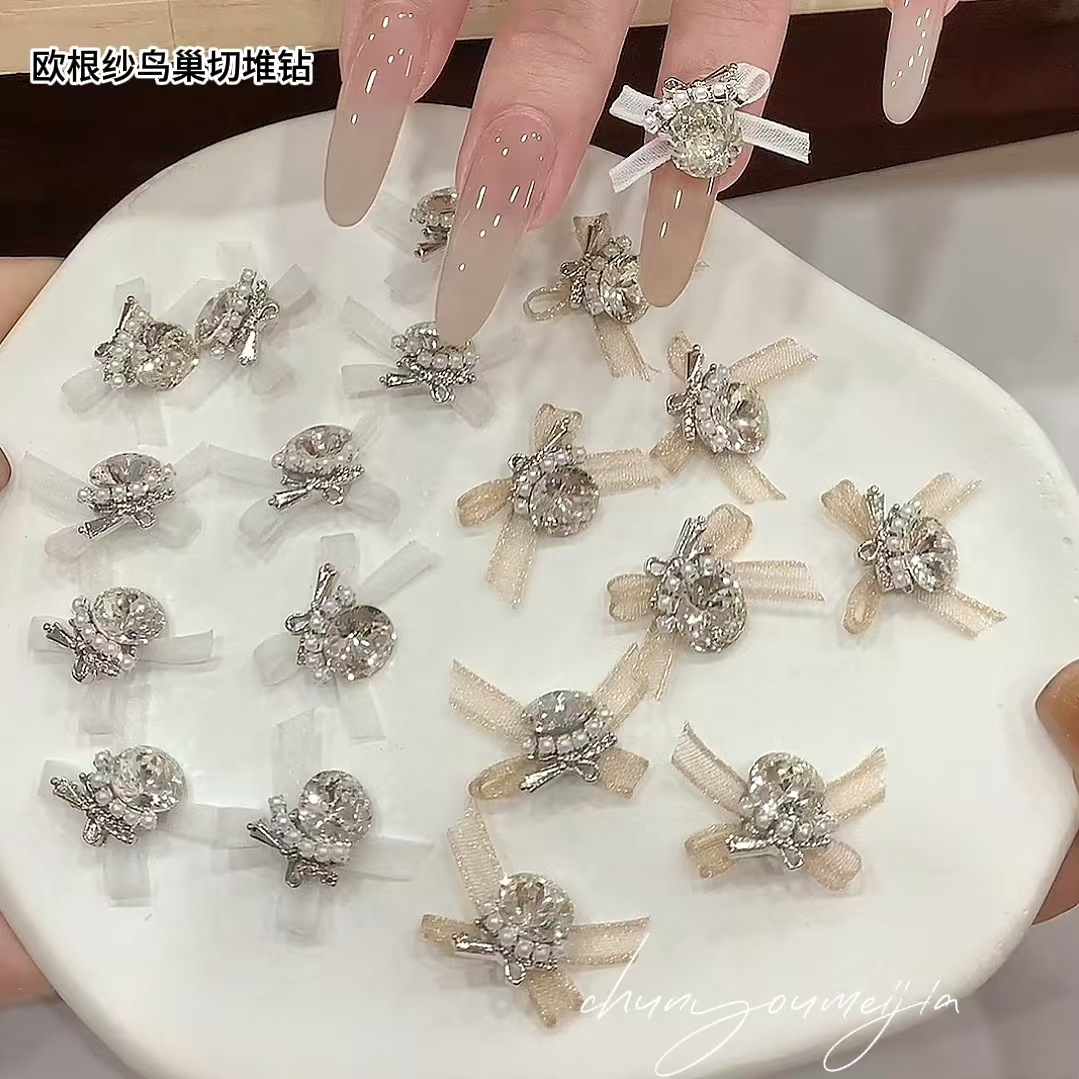 Nuevo taladro de uñas de alta calidad nido de pájaro cortar productos acabados de hilo de Ogan taladro explosivo flash taladro de bola de red de uñas decoración