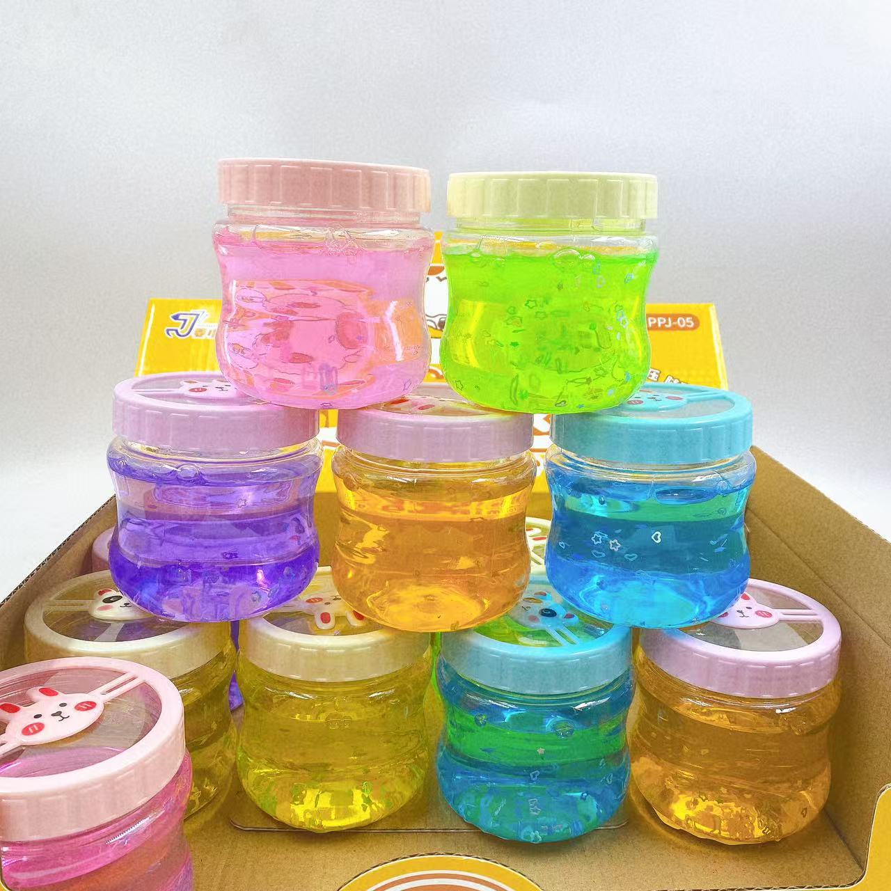 Nuevo color barro dibujos animados pegamento espumoso color brillante rompecabezas de alta transparencia descompresión hecha a mano juguetes para niños al por mayor