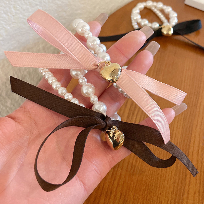 Cuerdas de cabello de arco de perlas francesas elegantes cabello de niña anillo de cabello cuerdas de cabeza dulce textura universal joyas de cabello tarjetas de cabello