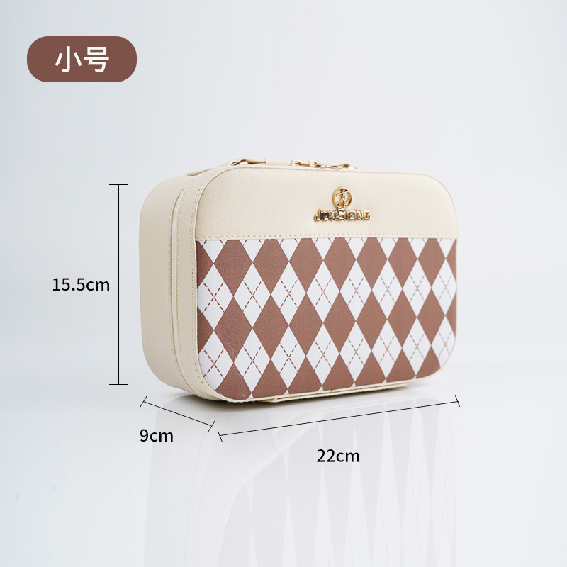 2024 nueva caja de cosméticos de alto valor caja de almacenamiento de cosméticos de gran capacidad caja de mano de regalo de cuero de PU