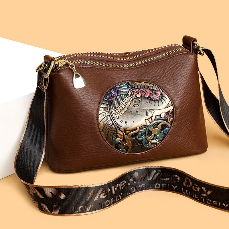 跨境复古文艺国风吉象压花斜挎包时尚大容量宽肩带单肩斜挎包包女